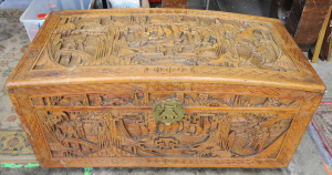 Lot 004 - Vintage heavily carved Chinese camphorwood chest on castors - 104cm W