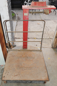 Lot 040 - Large platform luggage scale on wheels with weights made by Fairway Sc