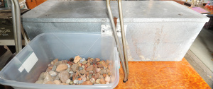 Lot 050 - Box Lot of Assorted Semi Polished Stones & Lockable Metal Storage