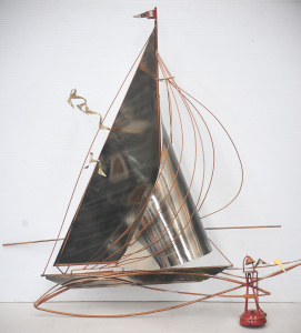 Lot 080 - Mixed metal wall hung sculpture of a yacht after Curtis Jere 73cm H