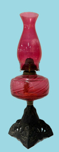 Lot 2 - Victorian Ruby glass oil lamp with swirl pattern bowl, ruby chimney &am