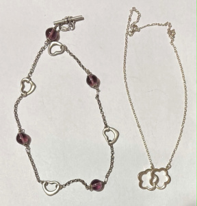 Lot 167 - 2 x silver necklaces - chain with open hearts and amethyst beads &
