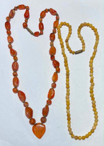 Lot 174 - 2 x vintage necklaces - yellow jade beads & natural polished Carne