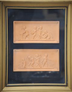 Pair framed P Ipsen Terracotta Relief Panels - Cupds - Each Panel 13cm H x 28cm