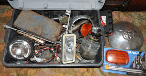 Lot 46 - Group of car tools & parts inc vintage Volvo hubcap, lamps, ratchet