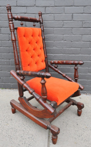 Lot 62 - Edwardian Dexter rocking chair with buttoned orange upholstery - 106cm