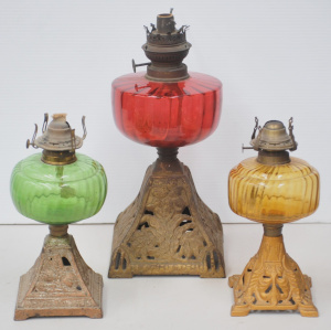 Lot 180 - 3 x oil Victorian lamps w ribbed coloured glass fonts green, amber, ru