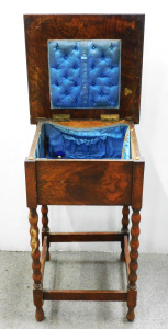 Lot 080 - Vintage Tudor style oak bobbin leg sewing table - 63cm H