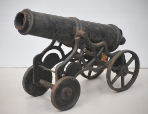 Lot 150 - Small vintage ornamental cast-iron cannon on gun carriage - 54cm L