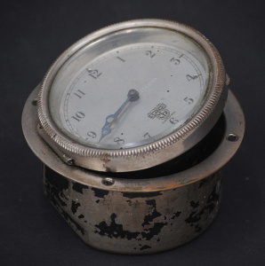 Lot 166 - Vintage Smiths London Car Dashboard Clock - in mount but needing atten
