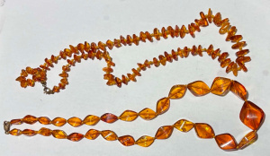Lot 168 - 2 x knotted Amber necklaces one with 9ct gold clasp