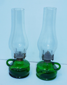 Lot 202 - Pair Vintage Green Glass Finger Oil Lamps - single handled with clear