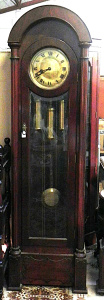 Lot 007 - Edwardian oak cased grandfather clock w Westminster Chimes, brass face