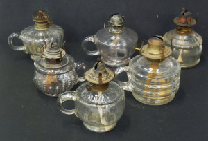 Lot 104 - Group of Victorian handled clear pressed oil lamps