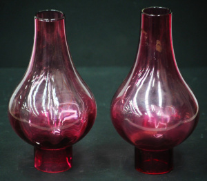 Lot 199 - Pair of vintage ruby glass oil lamp shades - 20cm H