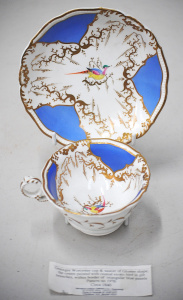 Lot 206 - c1840 Grainger Worcester cup and saucer with hand painted exotic bird