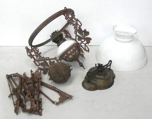 Lot 022 - Vintage cast iron banquet lamp (33cm W) with white glass shade and bra