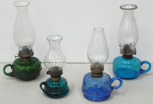Lot 125 - 4 x Vintage Coloured Glass Finger Oil Lamps with clear chimneys