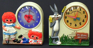 Lot 157 - 2 x vintage Janex kids' character Talking Alarm Clocks inc Raggedy Ann