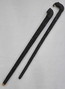 Lot 014 - 2 x AF Heavily Carved Ebony Walking Sticks
