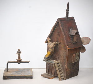 Lot 045 - c1880 Wooden Whirligig of a House with A Carved Man Turning a Handle w