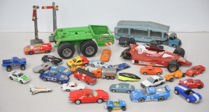 Lot 052 - Box lot of die-cast cars, trucks, trailers and accessories inc Dinky,
