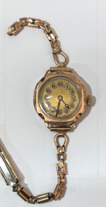 Lot 168 - 1920s Titan 9ct rose gold cased wristwatch with broken strap