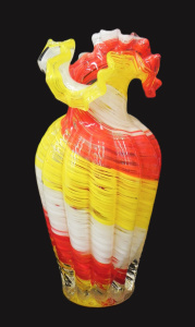Lot 189 - Hand blown Art Glass ribbed vase with ruffled lip and yellow, red and