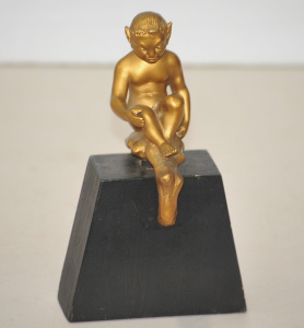 Lot 207 - Gilded Bronze mounted seated Putti 19cm H