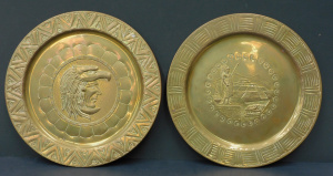 Lot 172 - 2 vintage brass wall plates depicting Aztec warriors - approx 25cm W