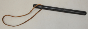 Lot 033 - Vintage Rubber truncheon - leather sling through handle, 33cm L
