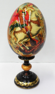 Lot 217 - Vintage Russian Lacquer ware Wooden Egg on Stand featuring handpainted