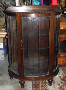 Lot 002 - 1930s Tudor Style Half Round Wooden Lead Light Display Cabinet w Three