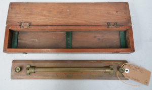 Lot 157 - 1940s boxed Otto Boettcer brass rolling ruler (England) - box 41cm W