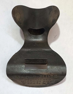Lot 163 - c1880 tin Magic Flute (nose whistle) 7 5cms L