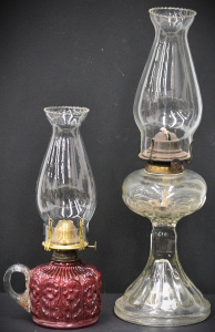 Lot 187 - 2 x Victorian oil lamps - Ruby finger lamp & clear pressed glass (