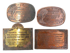 Lot 039 - 4 x reproduction brass and copper embossed comical plaques (widest 12