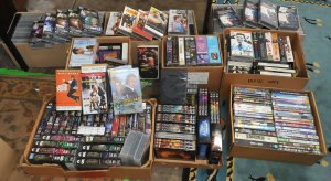Lot 067 - Large Group Lot of 9 x Boxes of Assorted VHS & DVD Movies & TV