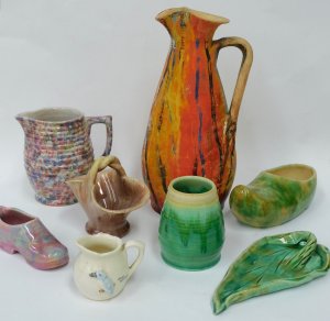 Lot 146 - Group lot of early 20thC Australian pottery inc unusual rainbow Remued
