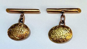 Lot 177 - Pr vintage 15ct gold oval cufflinks with floral pattern, various stamp