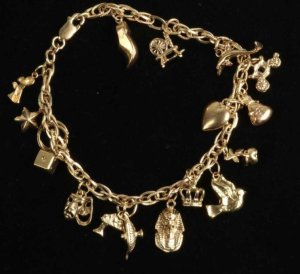Lot 161 - 9ct gold charm bracelet Marked 375 to clasp TW approx 21 7grms