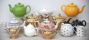 Lot 083 - Group of English ceramic teapots inc Saddler (Brown Betty, green, flor