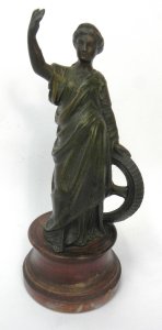 Lot 191 - Circa 1900 Bronze Patinated Spelter statuette on a wooden turned base,