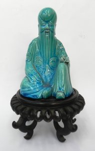 Lot 194 - Vintage Turquoise glazed Chinese Porcelain figure of a seated Deity wi
