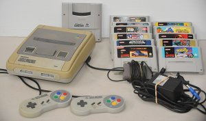 Lot 201 - Vintage Super Nintendo Entertainment System w 12 x Games, GBA Adaptor