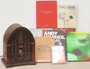 Lot 022 - Vintage style wood cased GE AMFM radio + group of non-fiction books in