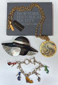 Lot 146 - Grp jewellery - inlaid shell woman in hat brooch, boxed Evocateur NY p