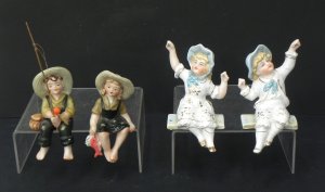Lot 185 - 2 x Pairs of porcelain shelf sitting brother & sister figurines in