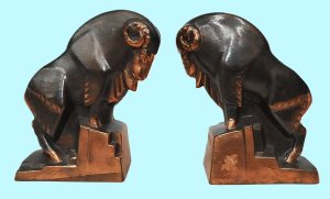 Lot 198 - Pair heavy vintage Cast Metal Art Deco Book Ends - Stylised Rams stand